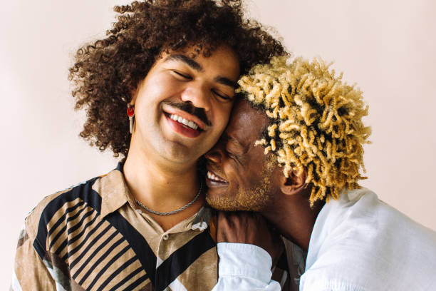 istock Affectionate young gay couple embracing each other 1329330905