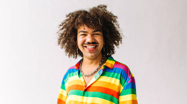 istock Gay man smiling in a studio 1329330908