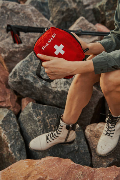 istock Person showing first aid kit to camera 1329332070