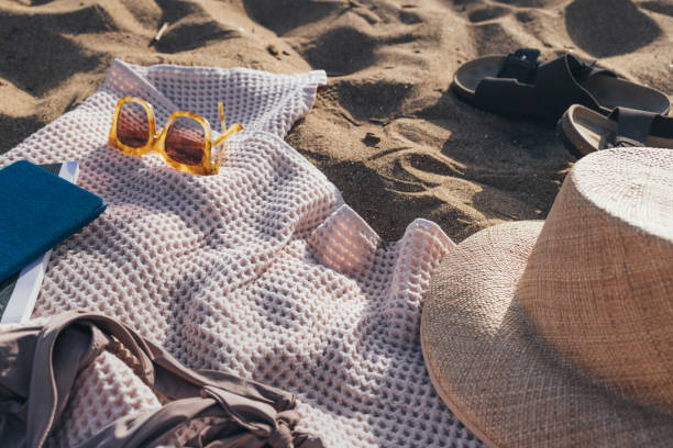 istock Ready for the Seaside: Beach Essentials Still Life on Sand 1329334412