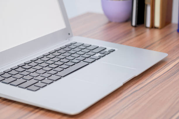 istock notebook computer was placed at the desk in the room 1329338539