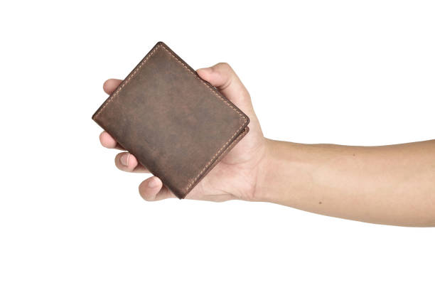 istock Leather Wallet In Hand Isolated On White Background With Clipping Path 1329339981