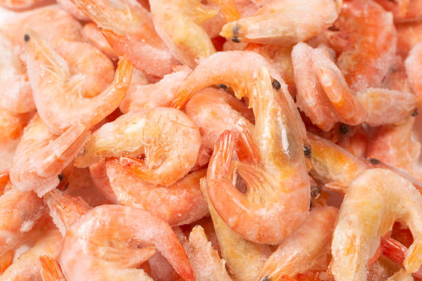 istock Fresh shrimps in ice. Top view. 1329341914
