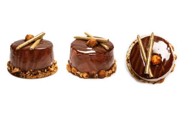 istock Chocolate and caramel cake isolated on a white background. 1329341927