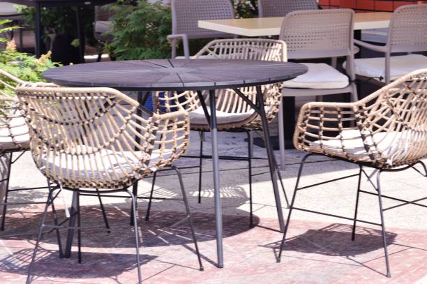 istock Tables and chairs in a cafe 1329343052