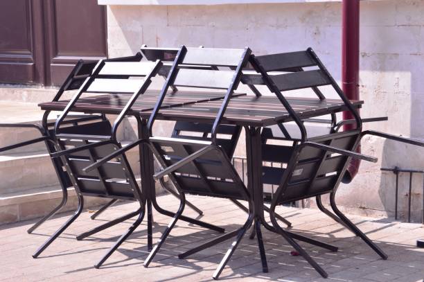istock Tables and chairs in a cafe 1329343065