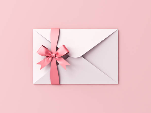 istock White envelope with pink ribbon bow isolated on pink pastel color background with shadow gift voucher minimal conceptual 1329343332