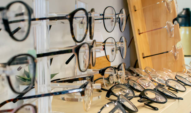istock Banner, background selective focus many eyeglasses for short eyesight people put on shelves for promotion discount mid or new year sales in a retail shop for customers buying. 1329346841