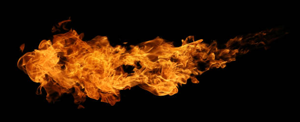 istock Fire and burning flame torch isolated on dark background for graphic design 1329350349