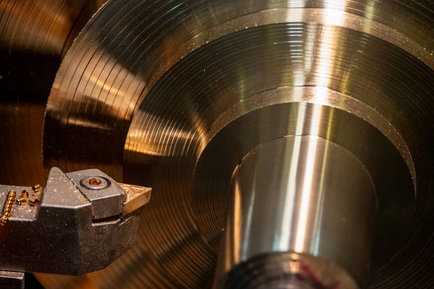 istock The lathe machine finishing process cut the brass shaft material. 1329350496