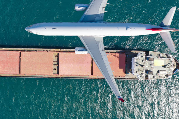 istock container ship in import export and business logistic. Container Cargo ship and cargo plane 1329353951