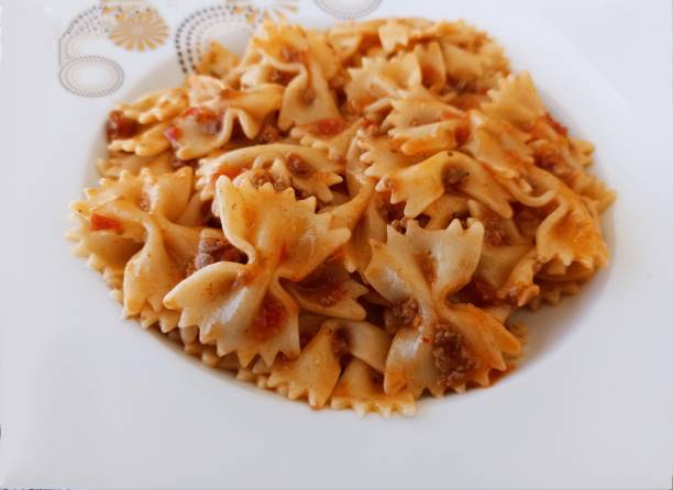 istock Farfelle macaroni with tomato and ground beef in bodrum turkey 1329357449