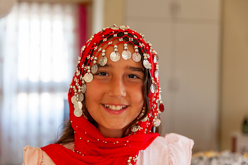 Portrait of a girl wearing hijab and Muslim clothing in the month of Ramadan