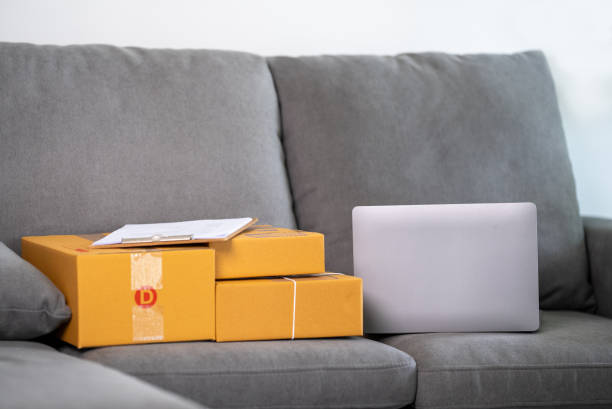 istock cardboard parcel box for online selling,Start up small business entrepreneur working online marketing packaging box delivery 1329366378