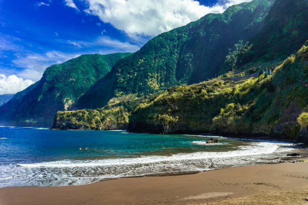 Natural sand beaches of Cais do Seixal, Madeira island stock photo