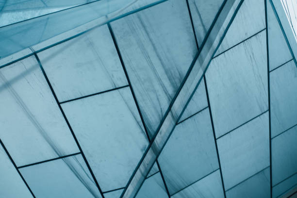istock underside panoramic and perspective view to steel blue glass high rise building skyscrapers, business concept of successful industrial architecture 1329370927
