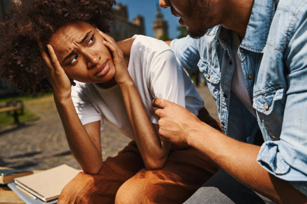 istock Upset young woman looking at her boyfriend 1329374600