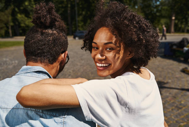 istock Lovely couple spending free time outdoors on sunny day 1329374764