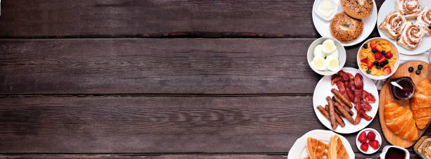 istock Breakfast or brunch side border on a dark wood banner background 1329381227