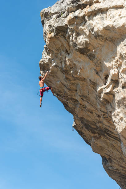 Dangling Rock 120+ Rock Climber Dangling By One Arm Stock Photos, Pictures & Royalty ...