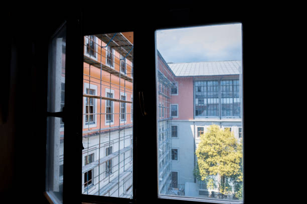 istock window view with high contrast with sun light and building platform 1329382632