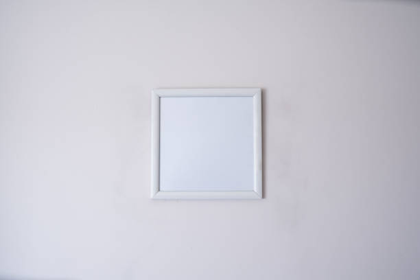 istock completely empty blank white square mockup frame on house wall at center 1329383619