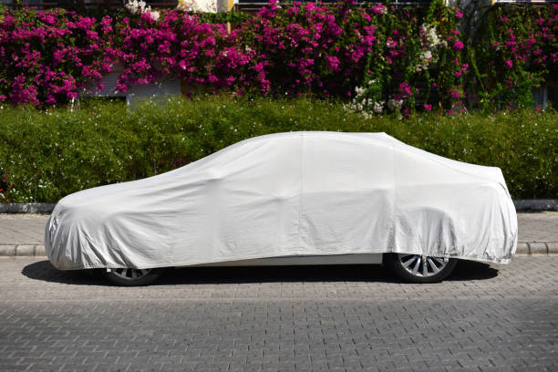 car covered with a sun protection fabric