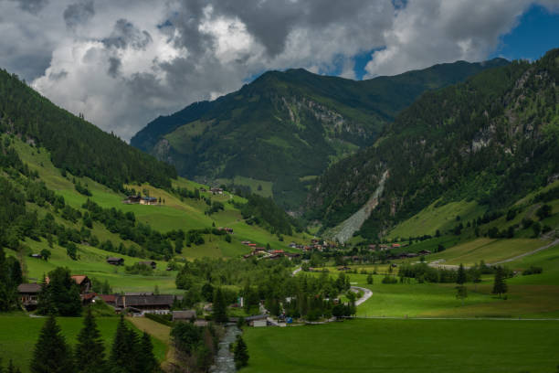 istock Valley near Kreealm waterfall in Austria Alps mountains on big wall 1329386778