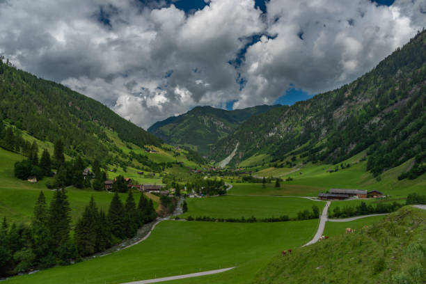 istock Valley near Kreealm waterfall in Austria Alps mountains on big wall 1329386790