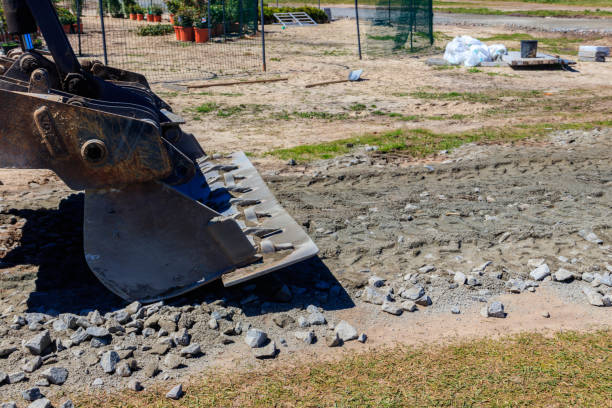 istock Close-up of bulldozer scoop on a road construction site 1329389784