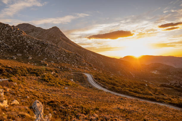 Shot of Swartberg Pass during sunset in the Little Karoo Western Cape South Africa Shot of Swartberg Pass during sunset in the Little Karoo Western Cape South Africa fynbos photos stock pictures, royalty-free photos & images