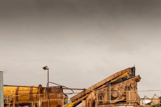 istock machinery for grinding minerals into soil 1329393447