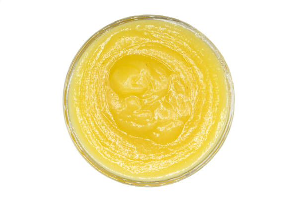 istock Applesauce in bowl isolated on white background top view 1329393493