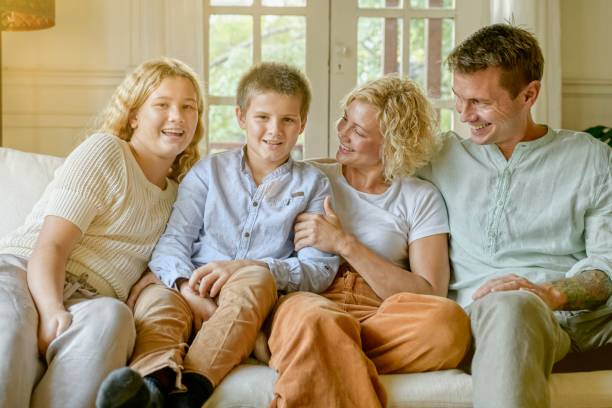 istock Joyful family having fun together 1329393651