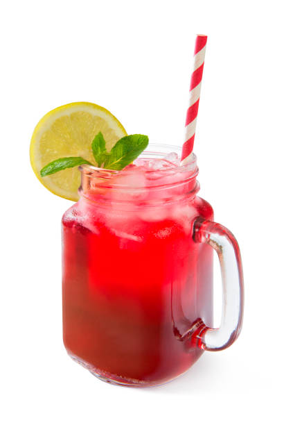 istock Strawberry, raspberry and cherry lemonade in a glass jar on a white background. 1329394267