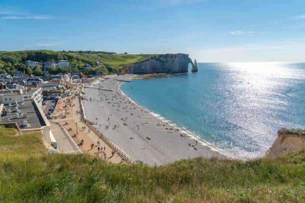 istock Etretat, France: Panoramic view of the cliffs of Etretat at sunset 1329398046