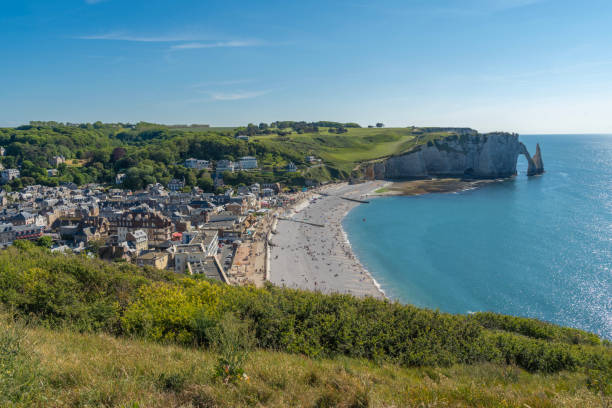 istock Etretat, France: Panoramic view of the cliffs of Etretat at sunset 1329398051