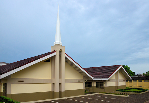 Monrovia, Liberia: Mormon temple - The Church of Christ of the Latter Day Saints compound on Horton Drive - façade with the traditional sharp steeple.