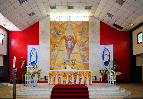 Monrovia, Liberia: main altar of the Catholic Cathedral of the Sacred Heart of Jesus - Christ and angels, decoration with tesserae tiles - headquarters of the Metropolitan Archdiocese of Monrovia (Archidioecesis Monroviensis) - Broad Street