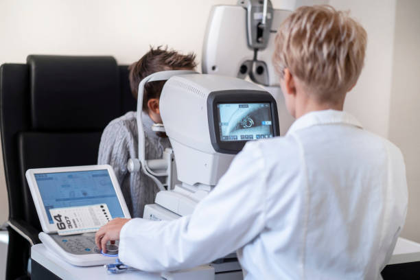 istock A boy getting an eye test in a very modern clinic 1329398985