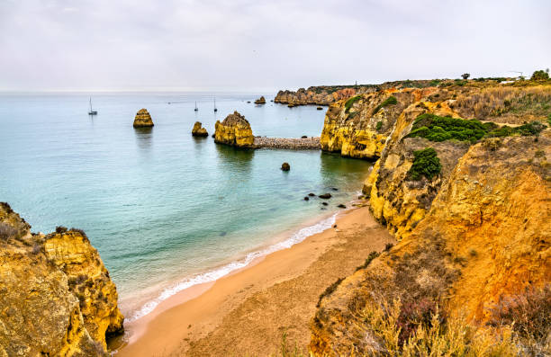 istock Coastal cliffs at Lagos - Algarve, Portugal 1329399207