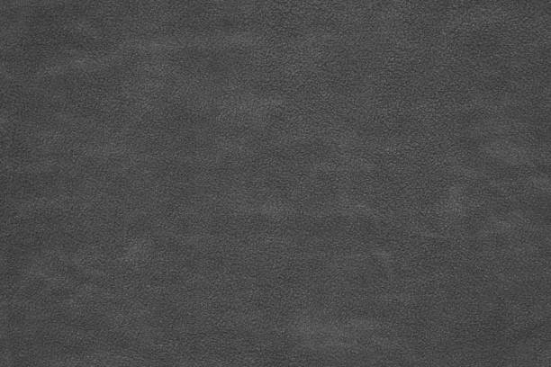istock textured material or fabric for dark background 1329399223