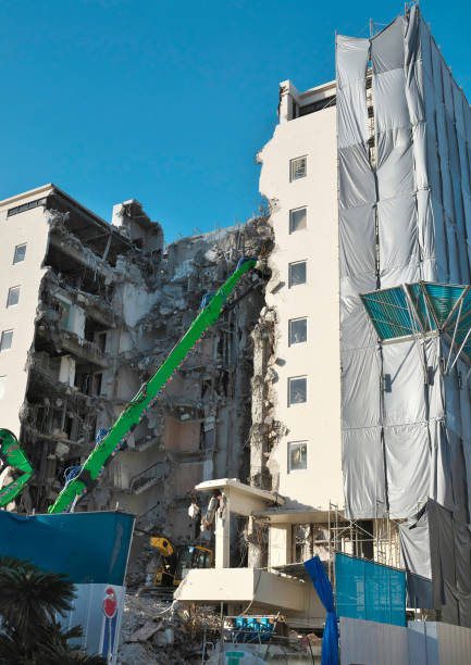 istock Mechanical destruction of a hotel under blue sky 1329402933