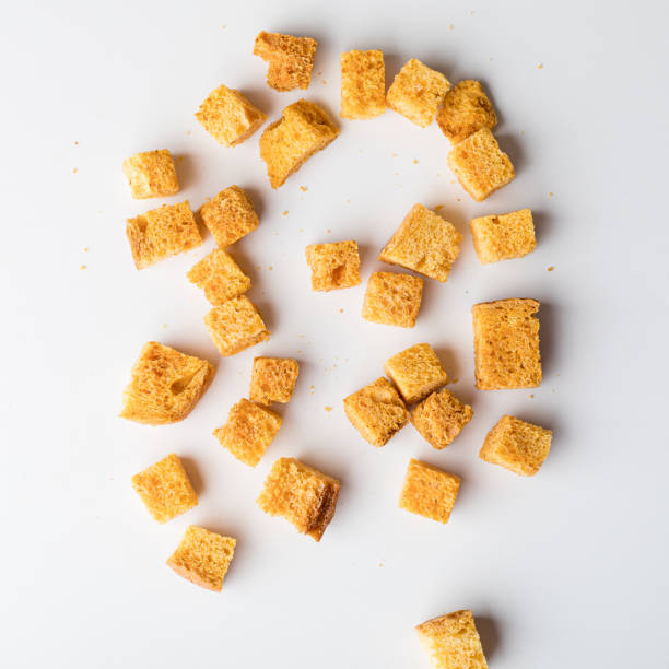 istock Square breadcrumbs. Oven-fried golden brown bread crumbs. 1329403109