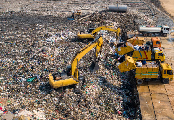 istock Garbage trucks are working in the waste sorting plant. 1329403996