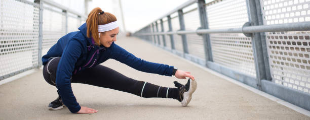 istock Woman exercising on the bridge 1329404034