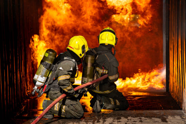 istock Firefighters are conducting fire drills by spraying water to extinguish the raging fire. 1329404773