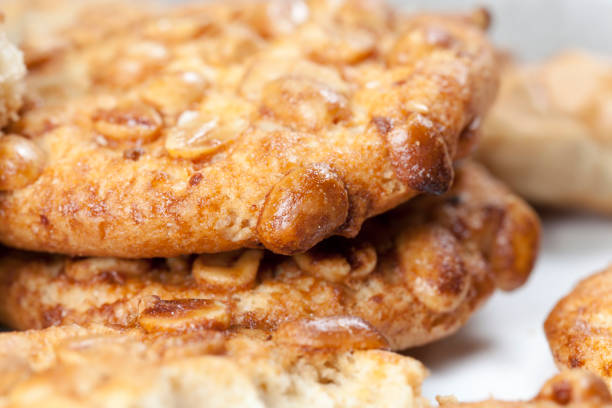 istock on the surface of a round cookie caramel with peanuts 1329405941
