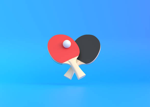 racchette rosse e nere per ping pong con palla bianca su sfondo blu - racchetta da volano foto e immagini stock