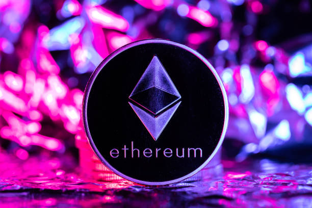 Ethereum cryptocurrency, physical coin in front of an abstract background Ethereum cryptocurrency, physical coin in front of an abstract background ethereum stock pictures, royalty-free photos & images